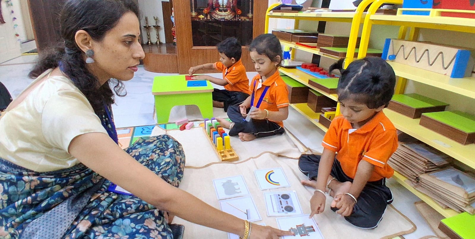 Sharada Gurukula children learning with their educator in RR Nagar